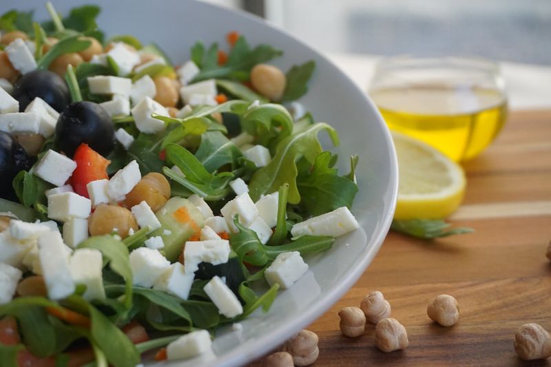 Mediterranean-style salad with olives, chickpeas and fresh vegetables